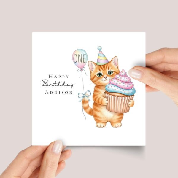 First Birthday Card With Orange Tabby Cat Holding Cupcake